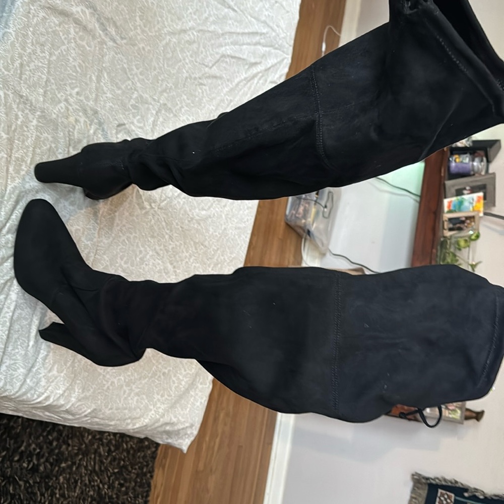 Black suede over the knee wedge heels.